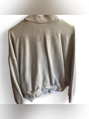 Fear of God Essentials cream hoodie